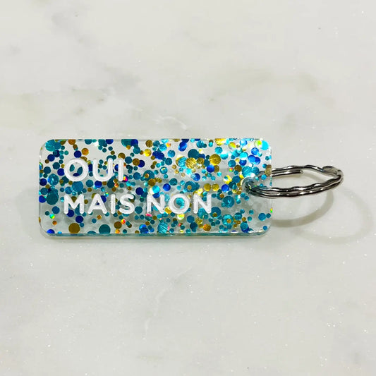 OUI MAIS NON Porte-clés à paillettes FUCHSIA/OR