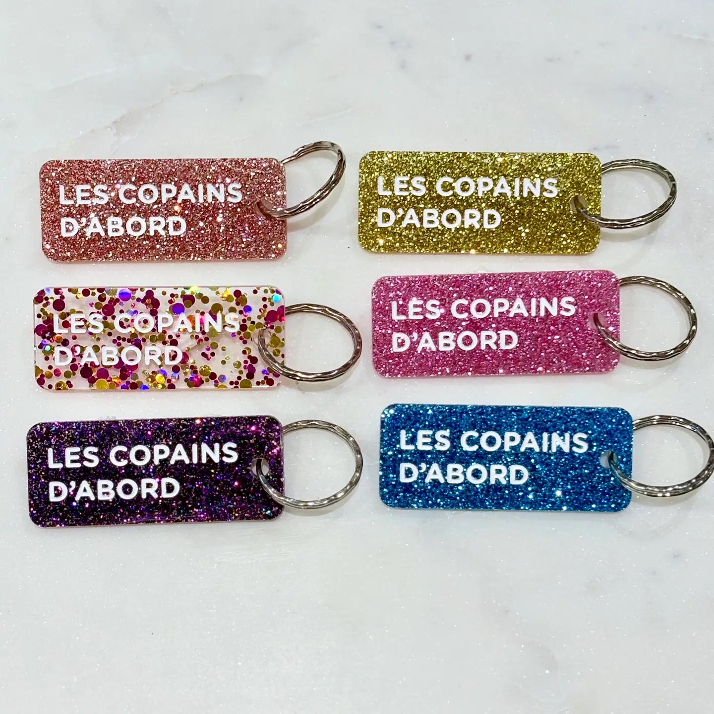 LES COPAINS D'ABORD Porte-clés à paillettes NOIR
