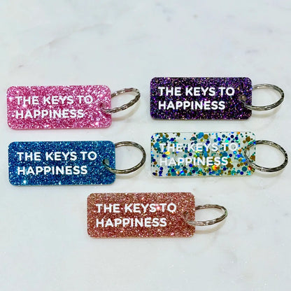 THE KEYS TO HAPPINESS Porte-clés à paillettes FUCHSIA